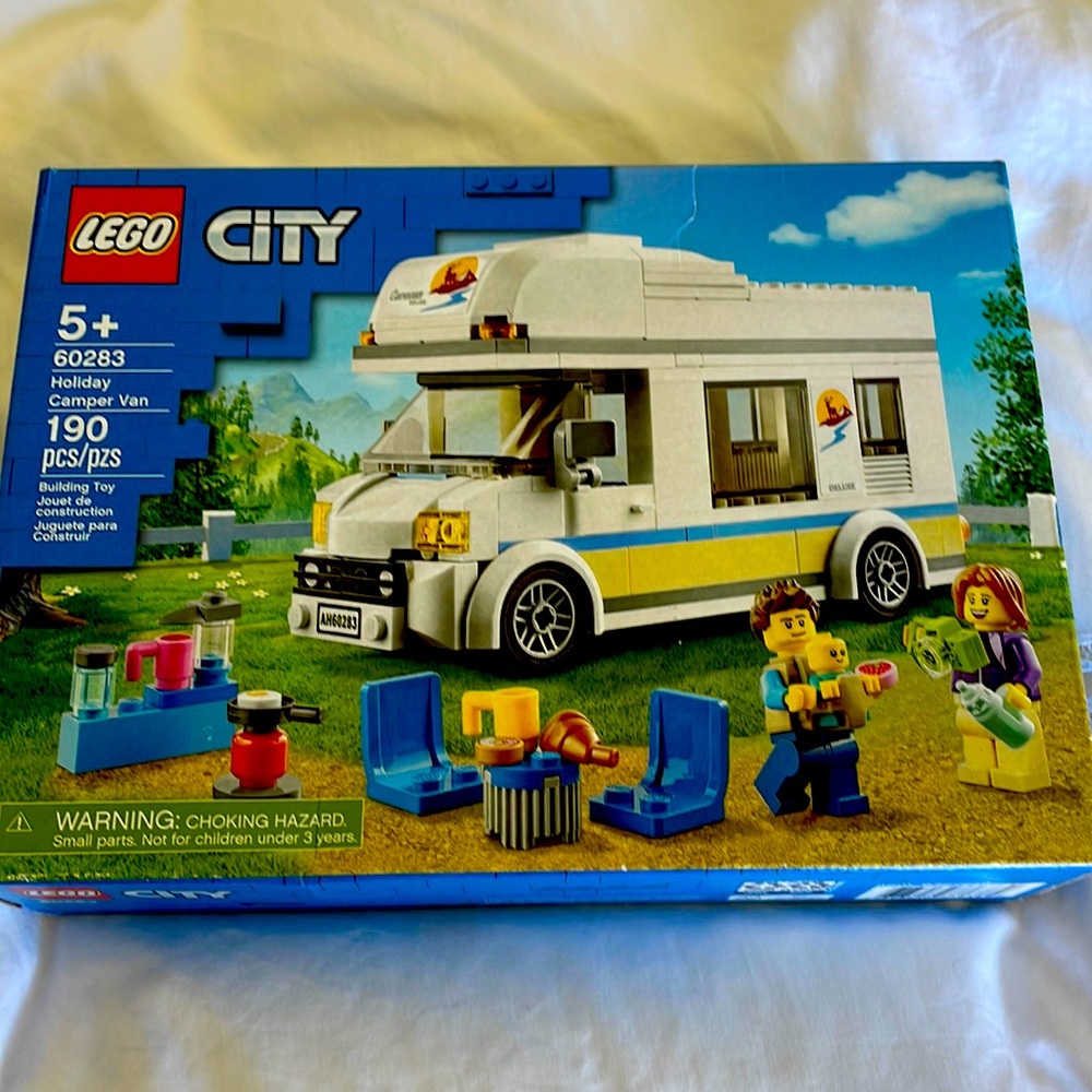 Never opened Lego city holiday camper van